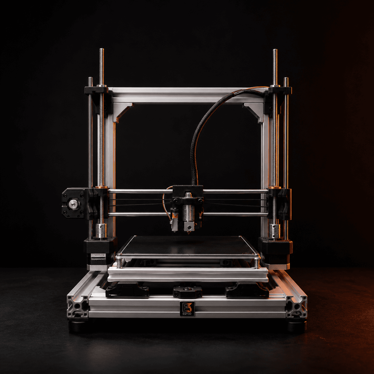 EGY3D landing image — precision 3D printer in an Egyptian workshop setting with premium printed products.